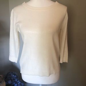 White sequined knit top with quarter length sleeves